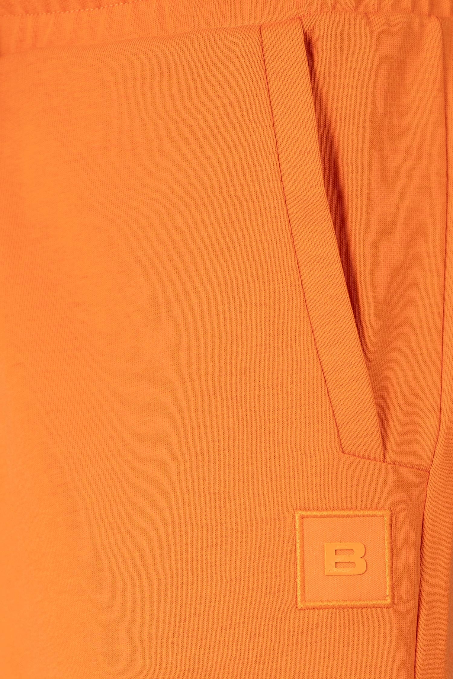 Slim body orange plain trousers 1